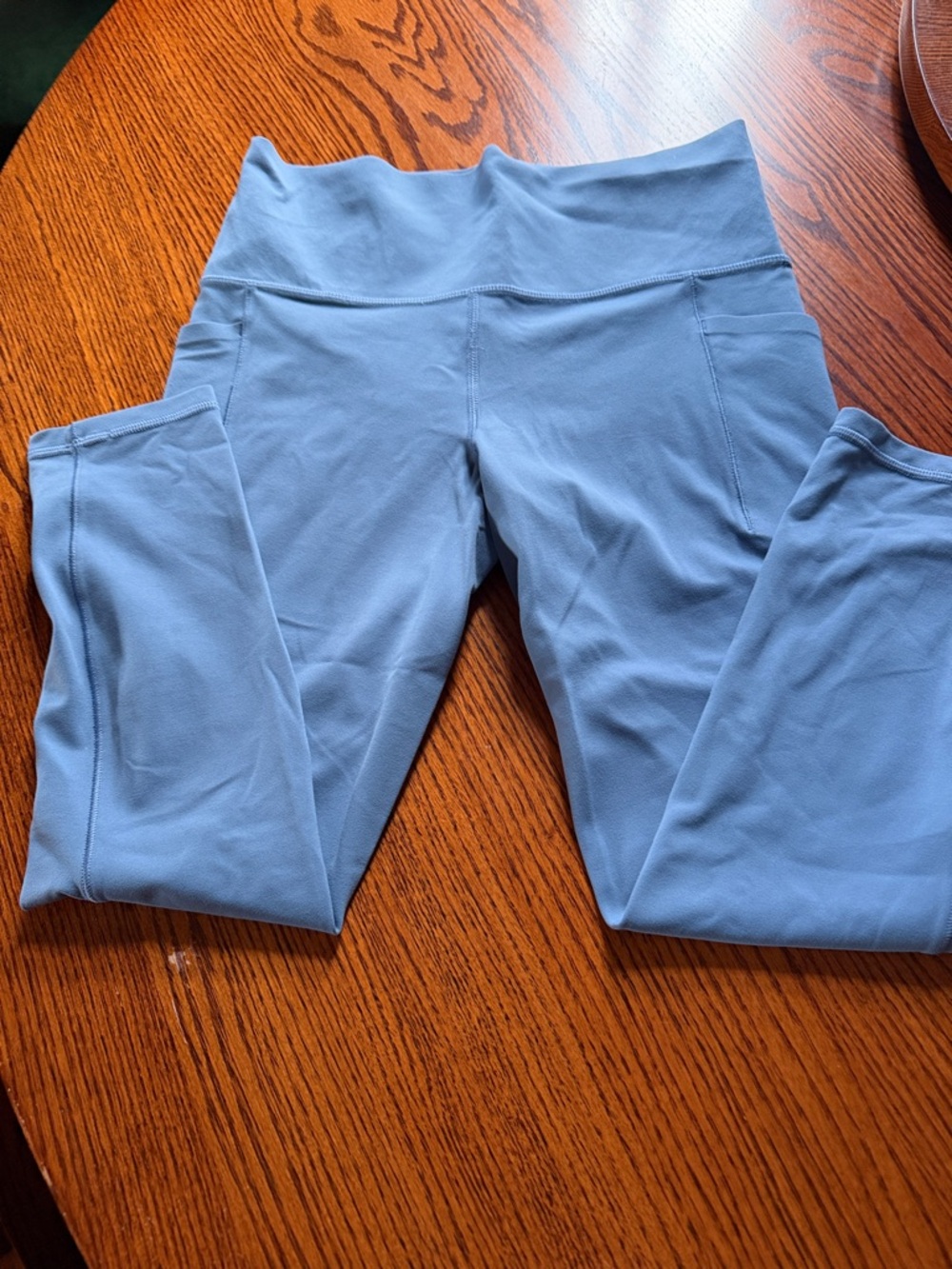 Athleta Salutation Stash 7/8 Tight in Dusty Blue